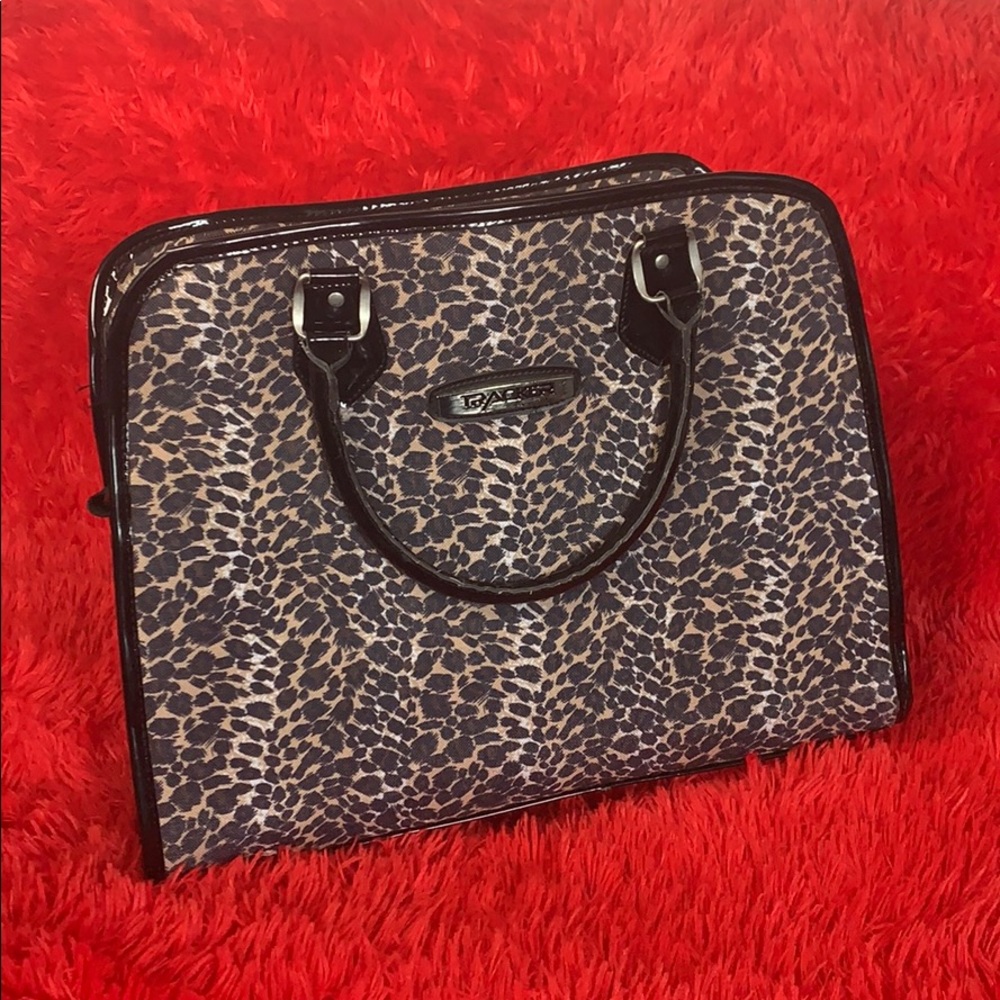 Tracker leopard print carry on luggage